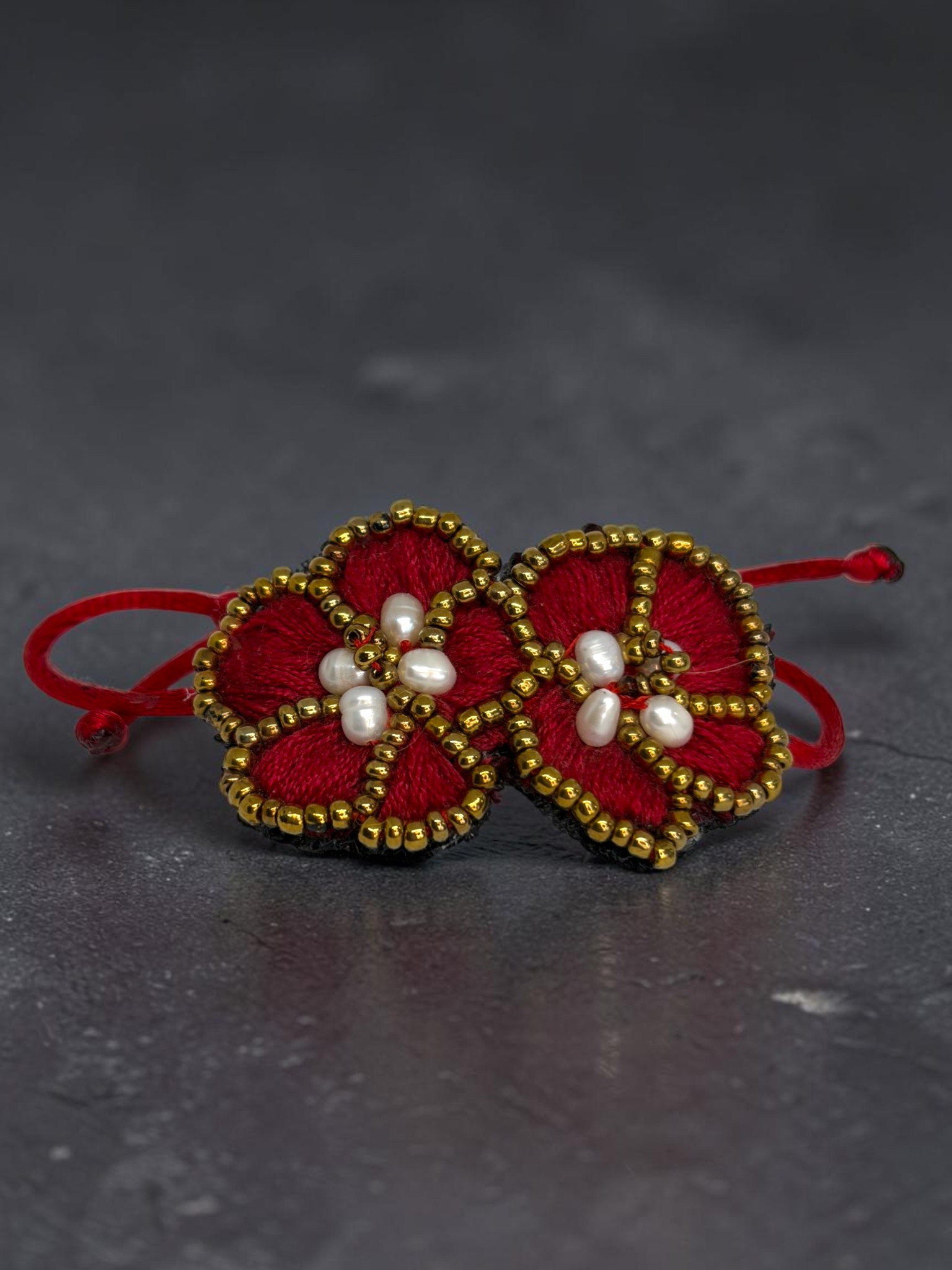 pulsera doble flor rojo