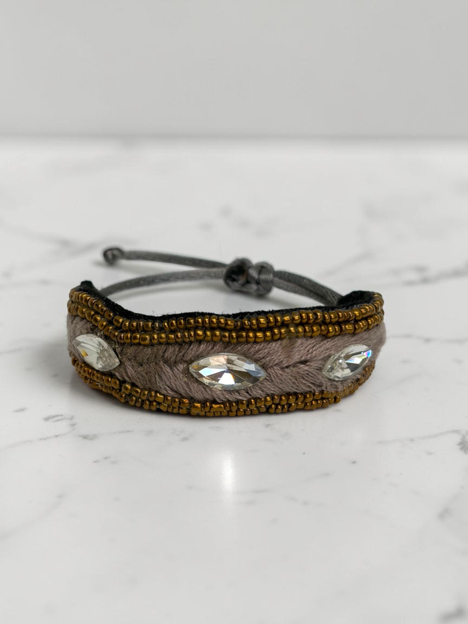 pulsera gris visón