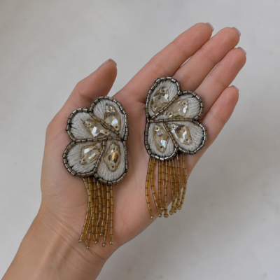 aro plumas y flecos círculo beige visón