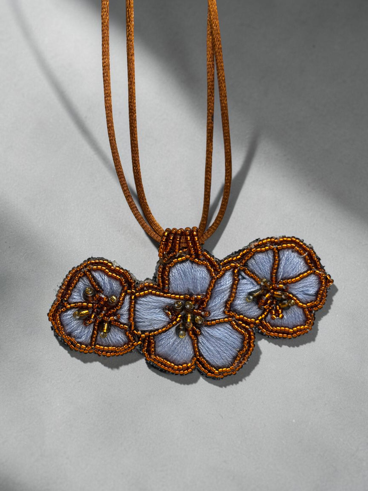Collar Trío Flores Celeste